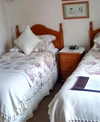 Twin beds at Aydon House